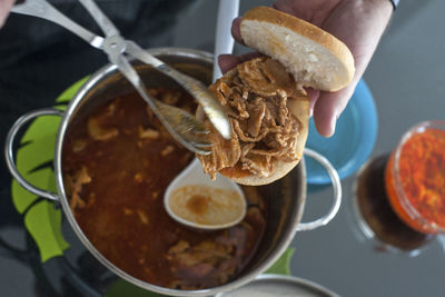 Cropped image of person having breakfast