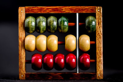 Close-up of fruits against black background