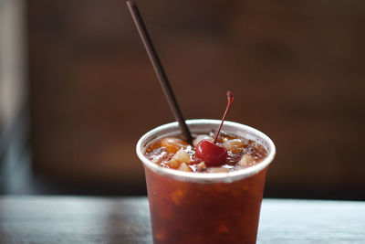 Close-up of drink served on table