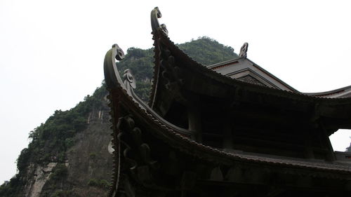 Low angle view of traditional building against sky