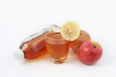 Close-up of drink against white background