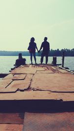 Man standing on pier