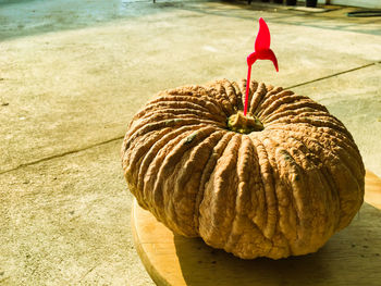 Close-up of damaged pumpkin on table