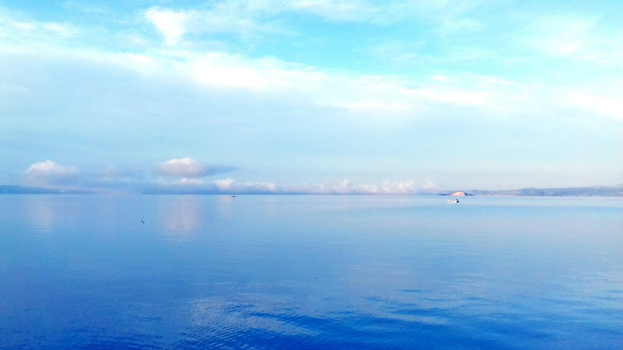 water, sea, scenics, tranquil scene, tranquility, waterfront, blue, beauty in nature, horizon over water, sky, seascape, nature, idyllic, cloud, cloud - sky, day, remote, calm, outdoors, majestic, non-urban scene, distant, ocean, water surface, no people