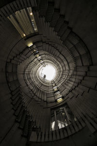 Low angle view of spiral staircase in building