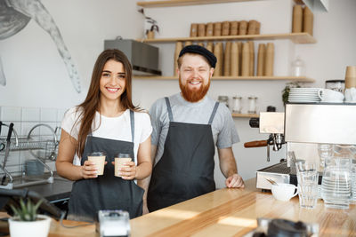 Portrait of smiling young couple