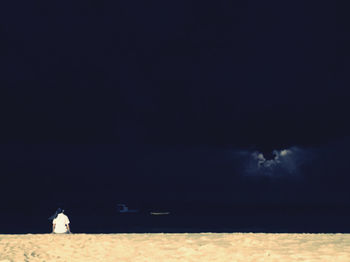 View of sea against sky at night