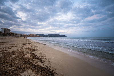 Scenic view of beach against sky