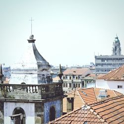 High section of historic tower against clear sky