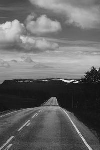 Empty road against sky