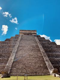 Low angle view of building against blue sky