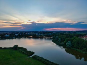 High angle view of river against sky at sunset