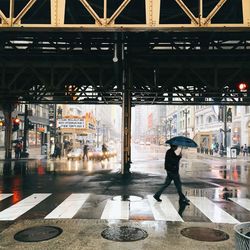 Full length of woman standing in city