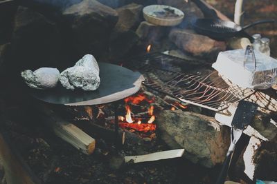 High angle view of fire on wood