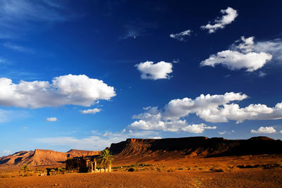 Distant view of atlas mountain at erg chebbi against sky