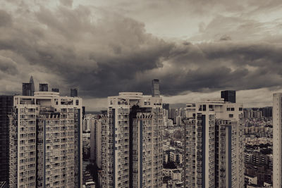 Modern buildings against sky in city