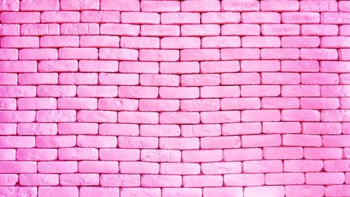 Soft pink brick wall texture background