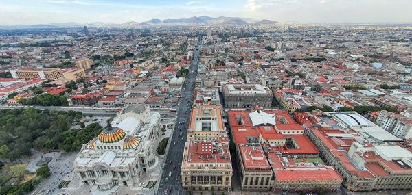 Aerial view of townscape against sky