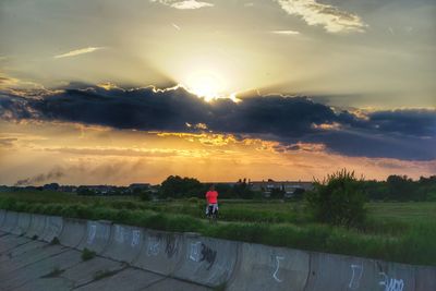 Scenic view of road against sky during sunset