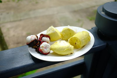 High angle view of fruits in plate on table