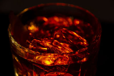 High angle view of fire in glass on table