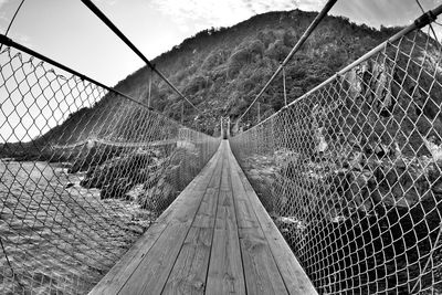 Close-up of bridge against sky