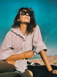 Mid adult man wearing sunglasses