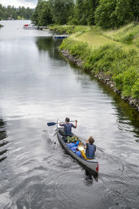 High angle view of men kayaking