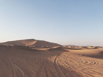 Scenic view of desert against clear sky