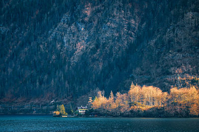 Scenic view of sea against mountain