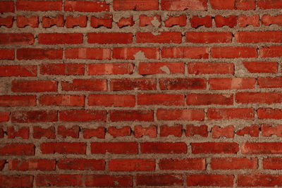 Full frame shot of red brick wall