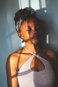 Portrait of young woman looking away