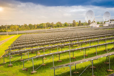 Panoramic shot of agricultural field against sky