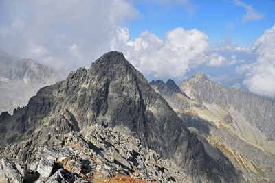 Scenic view of tatra mountains against cloudy sky
