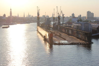 View of harbor at sunset