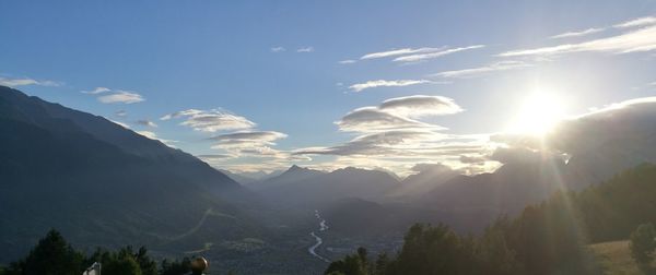 Scenic view of mountain against cloudy sky