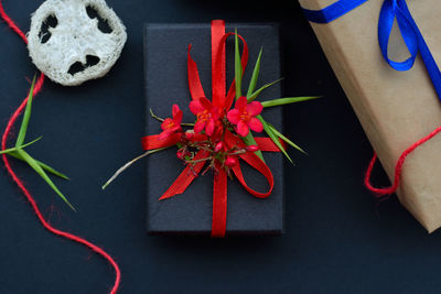 Directly above shot of gift boxes on black background