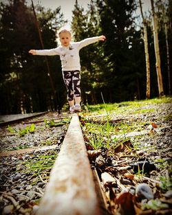 Boy jumping in garden