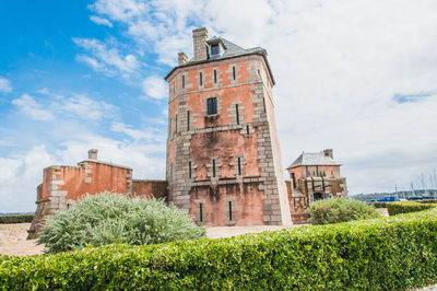 Low angle view of historical building against sky