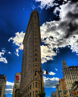 Low angle view of historical building against blue sky