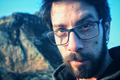Portrait of young man wearing eyeglasses