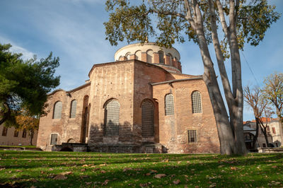 Exterior of historic building against sky