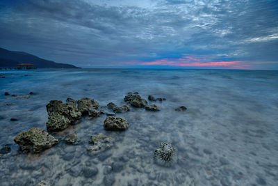 Scenic view of sea against sky during sunset