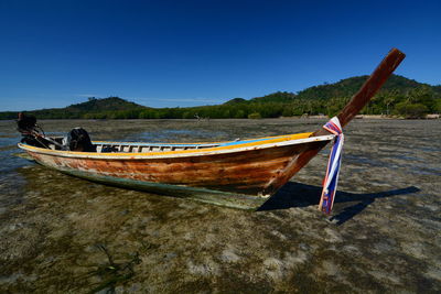 Boat in sea against clear sky