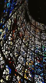 Low angle view of multi colored lights