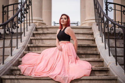 Portrait of woman on staircase