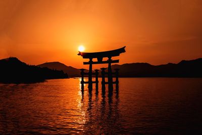 Scenic view of sea at sunset