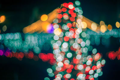 Defocused image of illuminated christmas lights