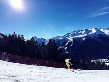 Scenic view of snowcapped mountain against sky