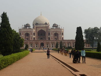 Group of people in front of building